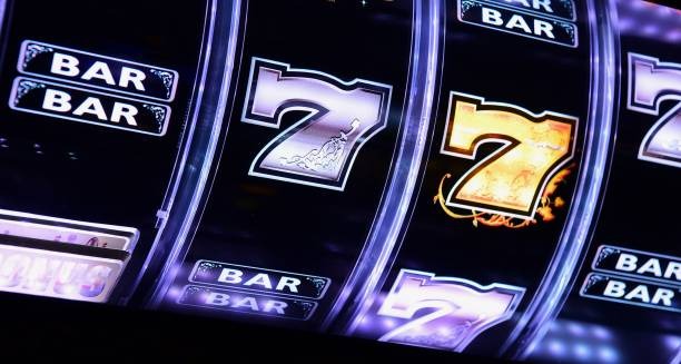Live dealer dealing cards at Lightning Baccarat table